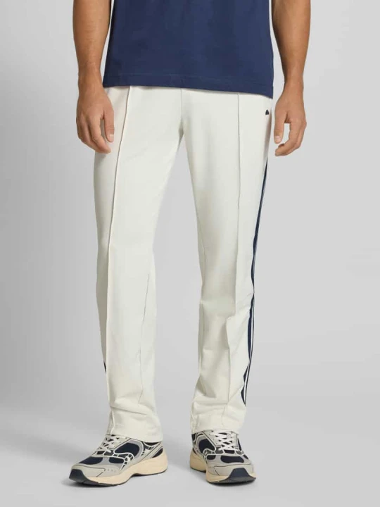 Zdjęcie produktu Spodnie typu track pants z elastycznym pasem model ‘LATUCCI’ Ellesse Złamany biały