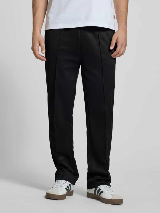 Zdjęcie produktu Spodnie typu track pants z pionowymi przeszyciami model 'Motus' Pegador Czarny