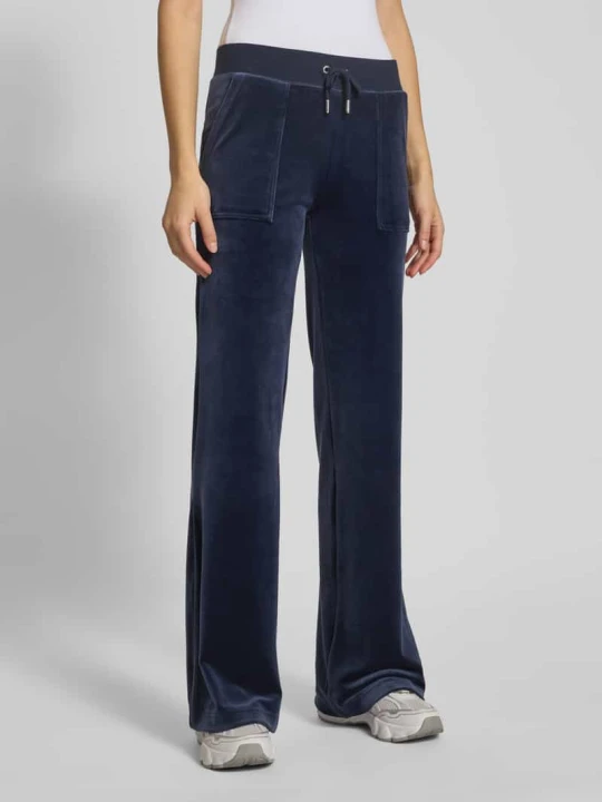 Zdjęcie produktu Spodnie typu track pants z wpuszczanymi kieszeniami model ‘LAYLA’ Juicy Couture Ciemnoniebieski