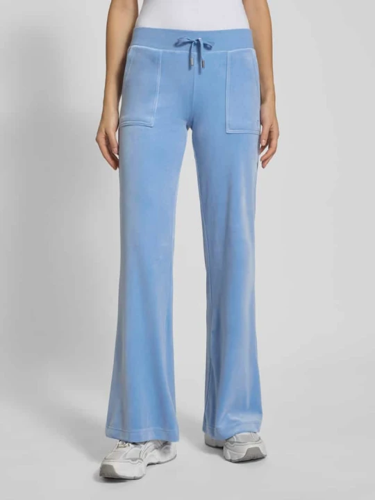 Zdjęcie produktu Spodnie typu track pants z wpuszczanymi kieszeniami model ‘LAYLA’ Juicy Couture Jasnoniebieski