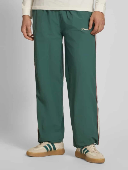 Zdjęcie produktu Spodnie typu track pants z wyhaftowanym logo model 'SLIPSTREAM' PROHIBITED Ciemnozielony