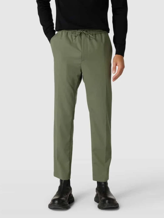 Zdjęcie produktu Spodnie w kant z mieszanki wiskozy Calvin Klein Oliwkowy