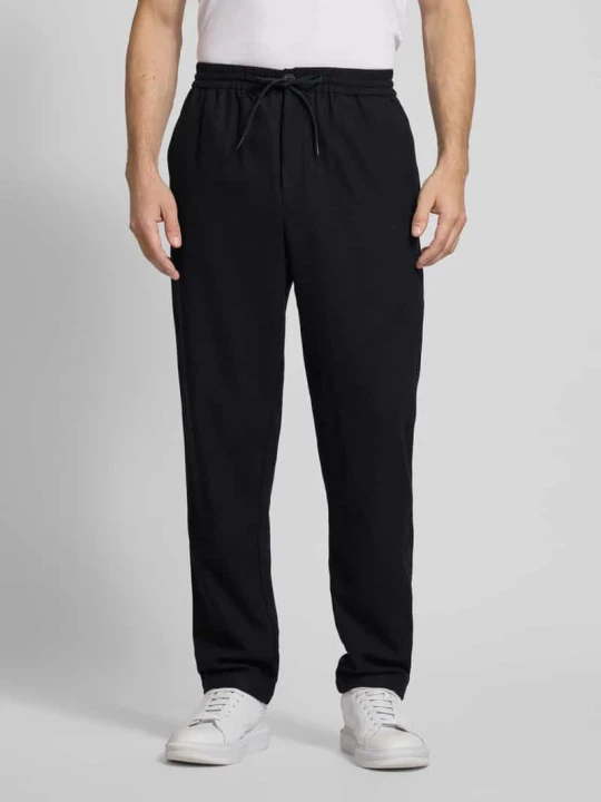 Zdjęcie produktu Spodnie wełniane o kroju tapered fit z tunelem model ‘Como’ Les Deux czarny