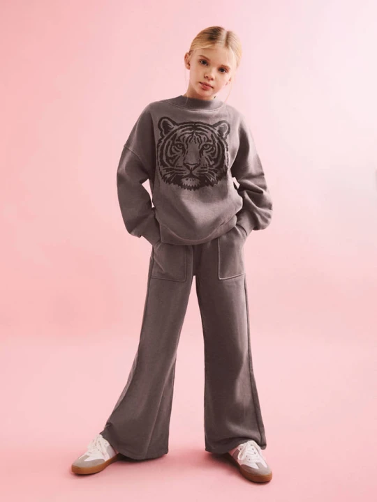 Zdjęcie produktu Spodnie wide leg z bawełny czekoladowy - Dzieci - lata - MANGO KIDS