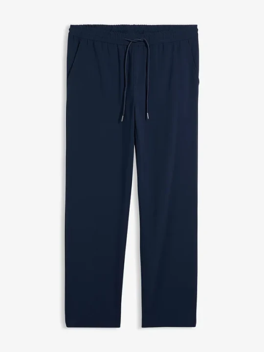 Zdjęcie produktu Spodnie z gumką w talii, ze stretchem, krój relaxed fit, straight BonPrix niebieski