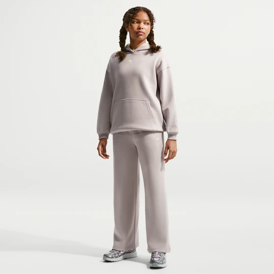 Zdjęcie produktu Spodnie z otwartym dołem dla dziewcząt Nike Studio Fleece - Brązowy