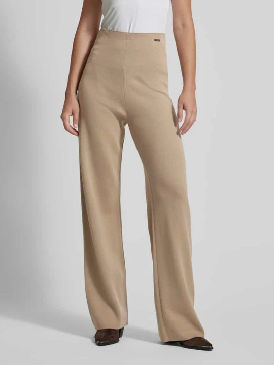 Zdjęcie produktu Spodnie z prostą nogawką i aplikacją z logo Calvin Klein Beżowy