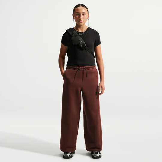 Zdjęcie produktu Spodnie z szerokimi nogawkami dla dużych dzieci (dziewcząt) Nike Tech Fleece - Fiolet