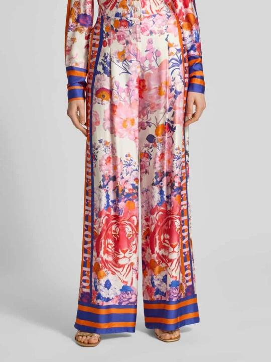 Zdjęcie produktu Spodnie z szerokimi nogawkami z wiskozy model 'wild Flower' Miss Goodlife Mocnoróżowy