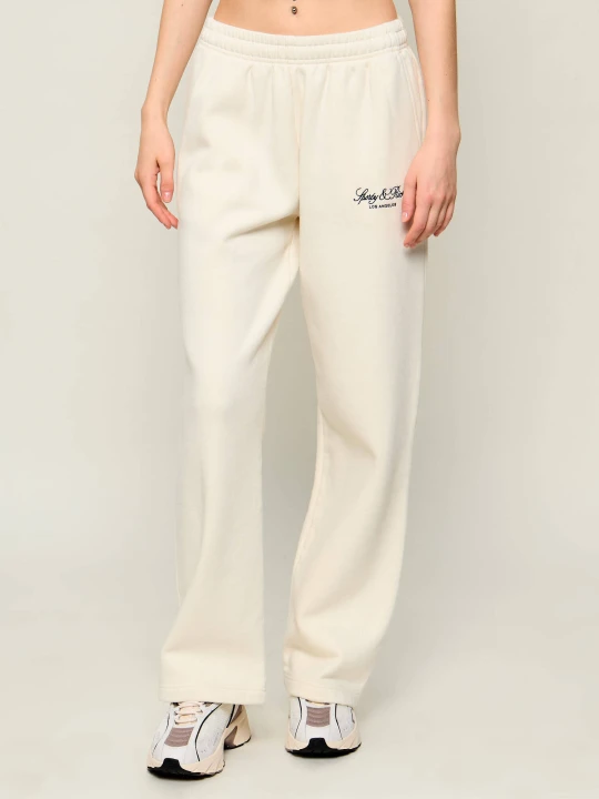 Zdjęcie produktu Sporty&Rich Spodnie dresowe BASILA | Relaxed fit Sporty & Rich ecru