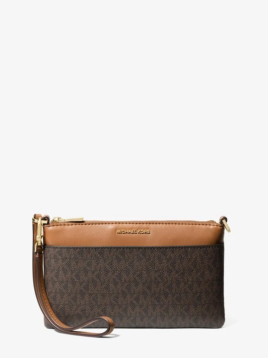 Zdjęcie produktu Średnia torebka Jet Set na nadgarstek z charakterystycznym logo Michael Kors złoty