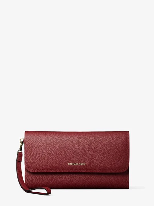 Zdjęcie produktu Średnia torebka na nadgarstek Jet Set na smartphona z groszkowej skóry Michael Kors