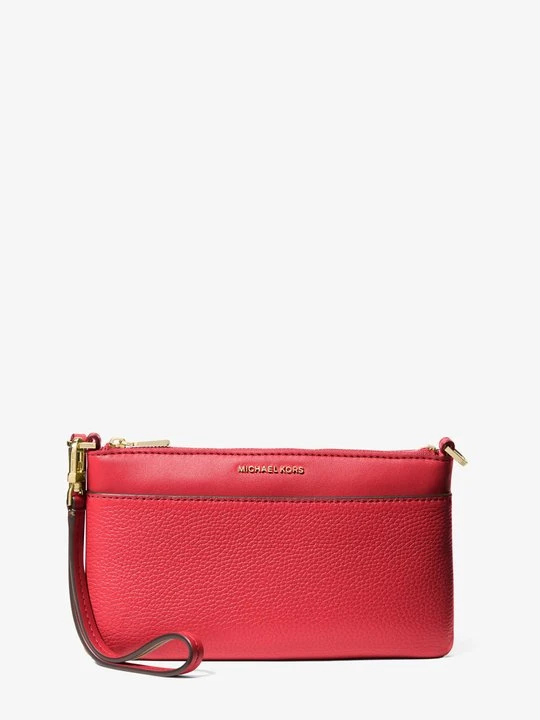 Zdjęcie produktu Średnia torebka na nadgarstek Jet Set z groszkowej skóry Michael Kors KARMAZYNOWY (Czerwony)