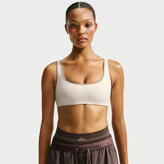 Zdjęcie produktu Stanik damski mikro z pogłębionym dekoltem NikeSKIMS Ribbed Seamless - Biel