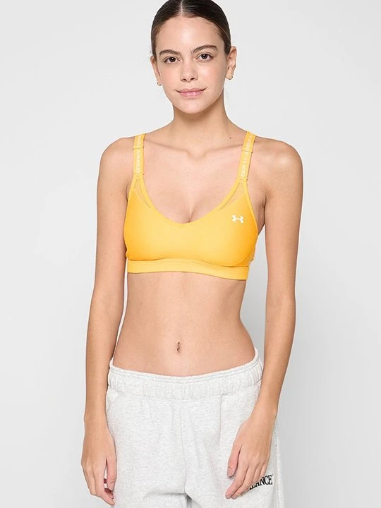 Zdjęcie produktu Stanik sportowy z średnim wsparciem Under Armour pomarańczowy
