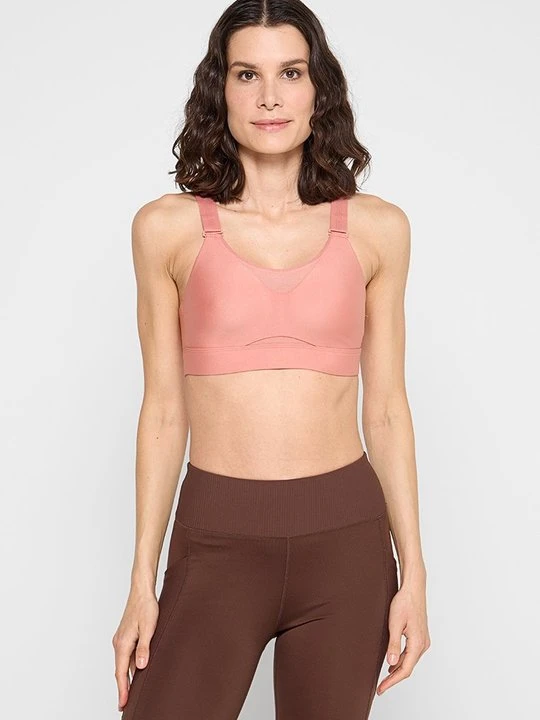 Zdjęcie produktu Stanik sportowy z średnim wsparciem Under Armour jasnoróżowy