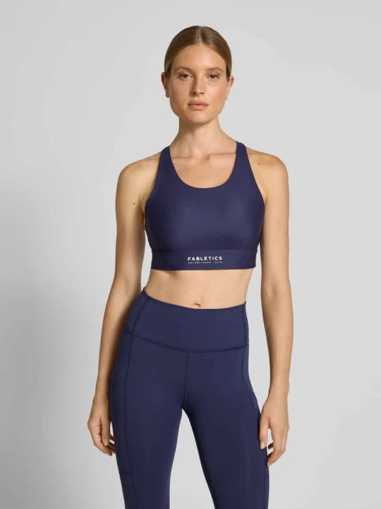 Zdjęcie produktu Stanik z logo i skrzyżowanymi ramiączkami Fabletics Ciemnoniebieski