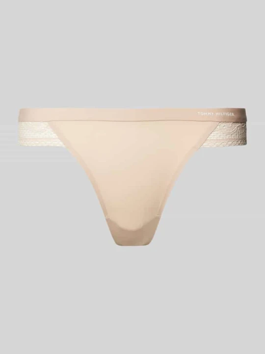 Zdjęcie produktu Stringi z obszyciem z koronki model ‘TAILORED COMFORT THONG’ Tommy Hilfiger Beżowy