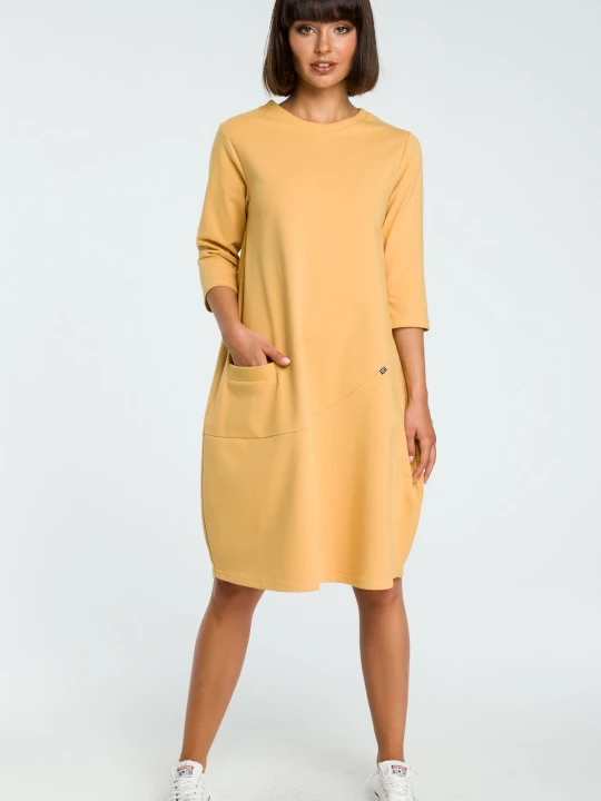 Zdjęcie produktu Sukienka dresowa bombka oversize z kieszonką z przodu żółta Be Wear