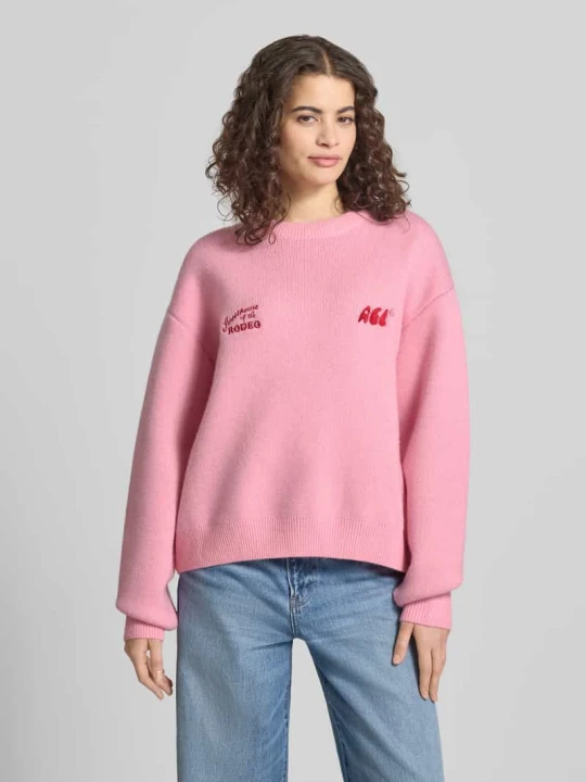 Zdjęcie produktu Sweter o kroju relaxed fit w dzianinowym stylu Another Cotton Lab Jasnoróżowy