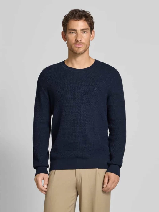 Zdjęcie produktu Sweter o kroju relaxed fit z efektem dzianiny model ‘Texture’ Calvin Klein Granatowy