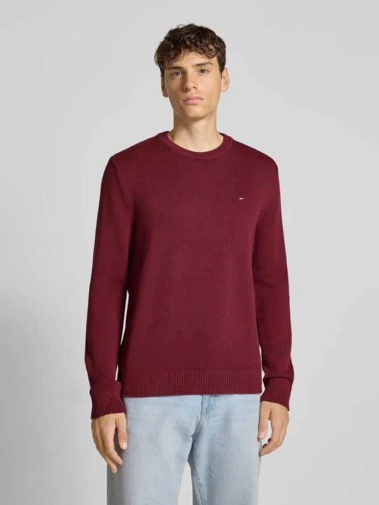 Zdjęcie produktu Sweter o kroju slim fit z czystej bawełny Tommy Jeans Bordowy