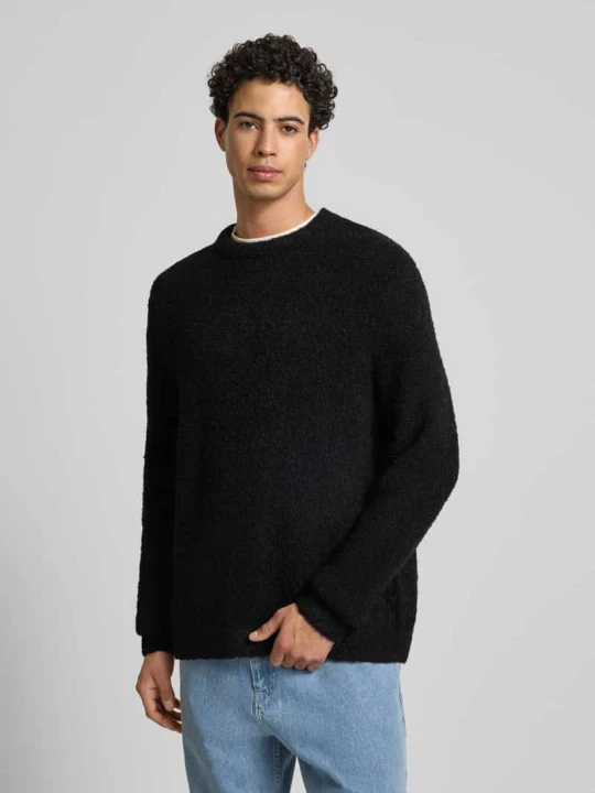 Zdjęcie produktu Sweter z dzianiny krój regular fit z dodatkiem wełny model „MEADOWS” Jack&Jones Czarny