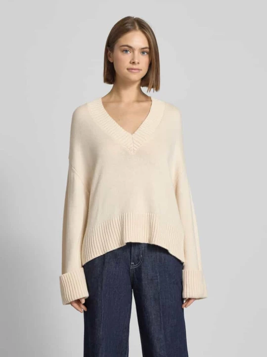 Zdjęcie produktu Sweter z dzianiny o kroju loose fit z dodatkiem wełny Gina Tricot Złamany biały