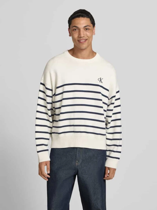 Zdjęcie produktu Sweter z dzianiny o kroju regular fit z czystej bawełny Calvin Klein Jeans Złamany biały
