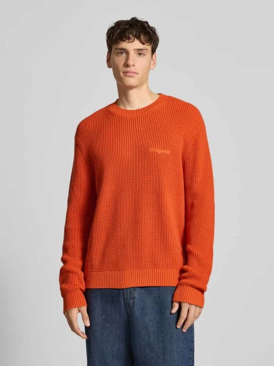 Zdjęcie produktu Sweter z dzianiny o kroju regular fit z czystej bawełny Tommy Jeans Pomarańczowy