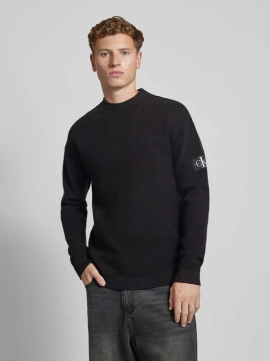 Zdjęcie produktu Sweter z dzianiny o kroju relaxed fit z naszywką z logo Calvin Klein Jeans Czarny