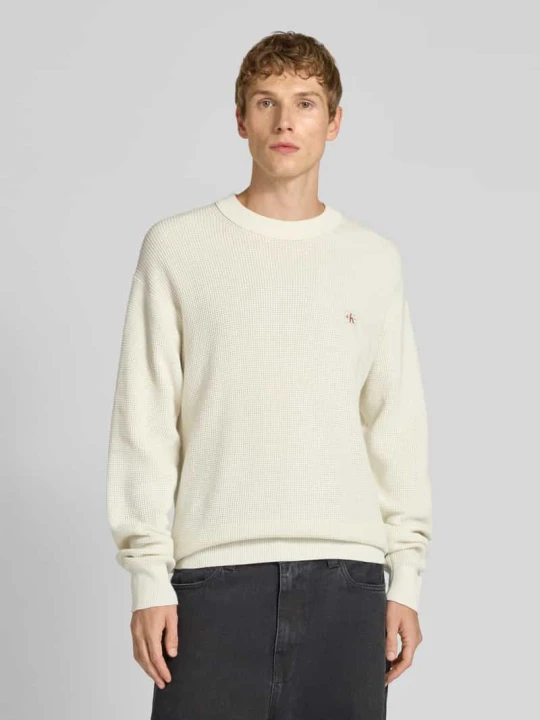 Zdjęcie produktu Sweter z dzianiny z naszywką z logo Calvin Klein Jeans Złamany biały