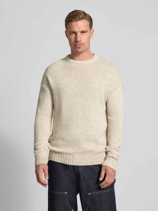 Zdjęcie produktu Sweter z dzianiny krój loose fit z dodatkiem wełny model „MALIO” Drykorn Piaskowy