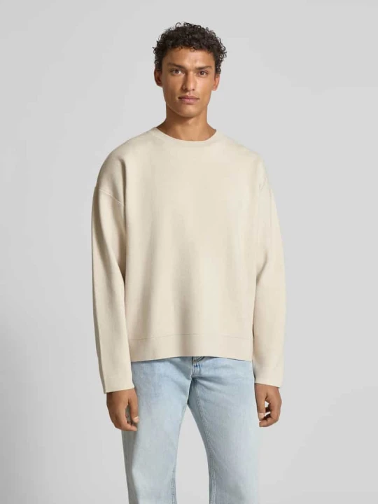 Zdjęcie produktu Sweter z dzianiny z okrągłym dekoltem model ‘BRADFORT’ Jack&Jones Złamany biały melanż