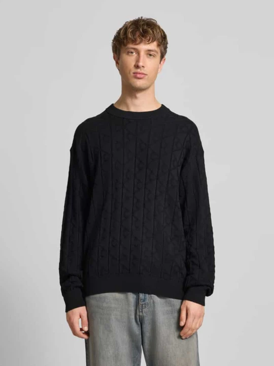 Zdjęcie produktu Sweter dzianinowy z okrągłym dekoltem model 'EASY' Calvin Klein Jeans Czarny