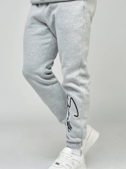 Zdjęcie produktu Szare joggery męskie z haftem logo SikSilk