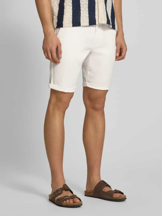 Zdjęcie produktu Szorty chino o kroju slim fit z mieszanka bawełny Tommy Jeans Złamany biały