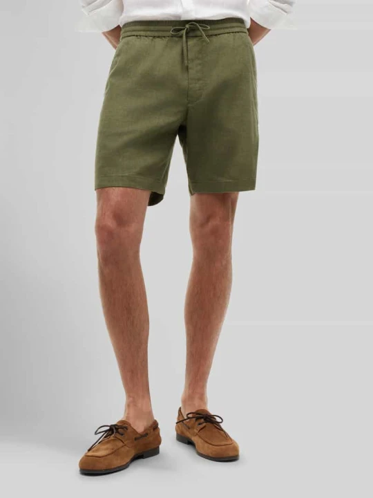 Zdjęcie produktu Szorty chino w kroju regular fit model 'DOVER' Tommy Hilfiger Limonkowy