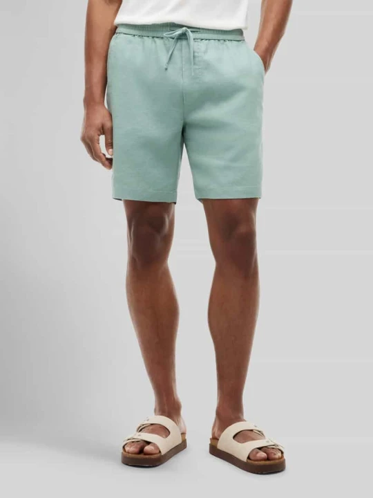 Zdjęcie produktu Szorty chino w kroju regular fit model 'DOVER' Tommy Hilfiger Turkusowy