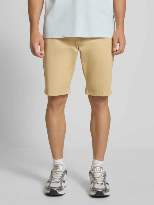 Zdjęcie produktu Szorty chinosy o kroju slim fit z mieszanki bawełny model ‘SCANTON’ Tommy Jeans Beżowy