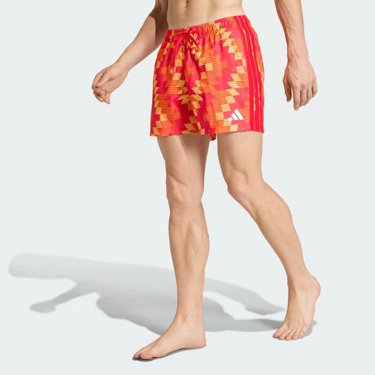 Zdjęcie produktu Szorty do pływania z grafiką inspirowaną piłką nożną; długość wewnętrznej strony nogawki: 13 cm Adidas pomarańczowy