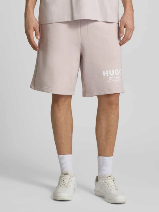 Zdjęcie produktu Szorty dresowe o kroju loose fit z czystej bawełny model 'Nomario' Hugo Jasnofioletowy