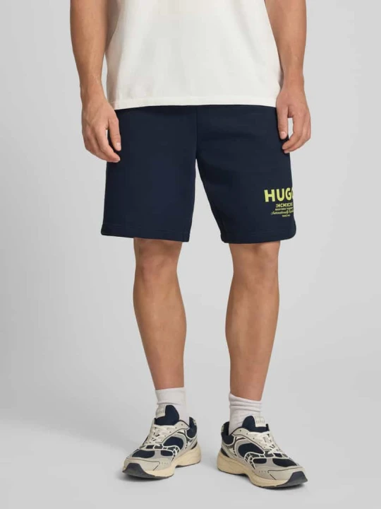 Zdjęcie produktu Szorty dresowe o kroju loose fit z czystej bawełny model 'NOMARIO' Hugo Granatowy