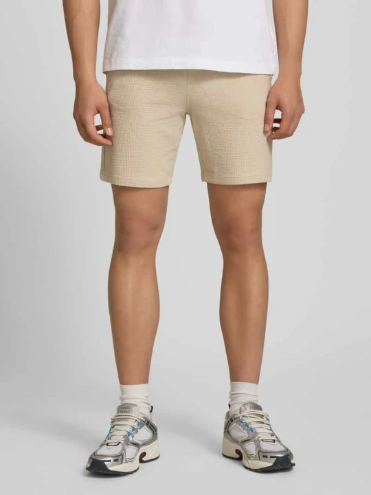 Zdjęcie produktu Szorty dresowe o kroju loose fit z mieszanki bawełny ekologicznej model 'KIAN' Only & Sons Beżowy