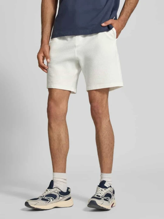 Zdjęcie produktu Szorty dresowe o kroju loose fit z mieszanki bawełny ekologicznej model 'KIAN' Only & Sons Biały