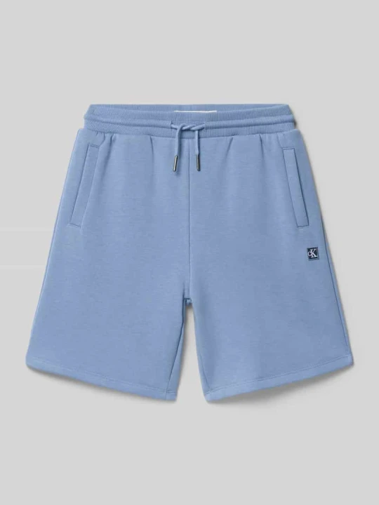 Zdjęcie produktu Szorty dresowe o kroju regular fit z mieszanka bawełny Calvin Klein Jeans Jasnoniebieski