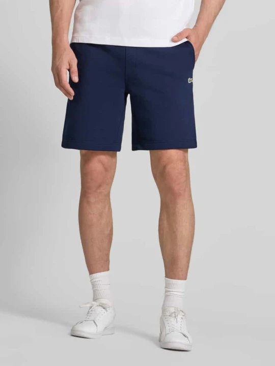 Zdjęcie produktu Szorty dresowe o kroju regular fit z mieszanka bawełny Lacoste Granatowy