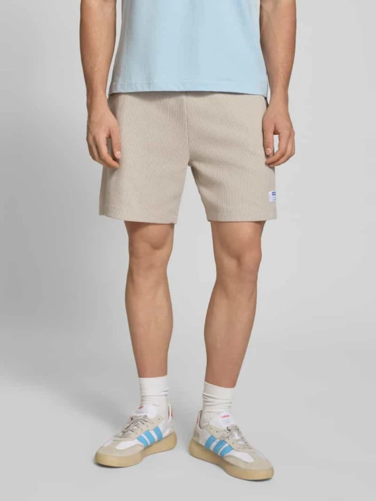 Zdjęcie produktu Szorty dresowe o kroju regular fit z mieszanka bawełny model 'NUWAFFLO' Hugo Złamany biały
