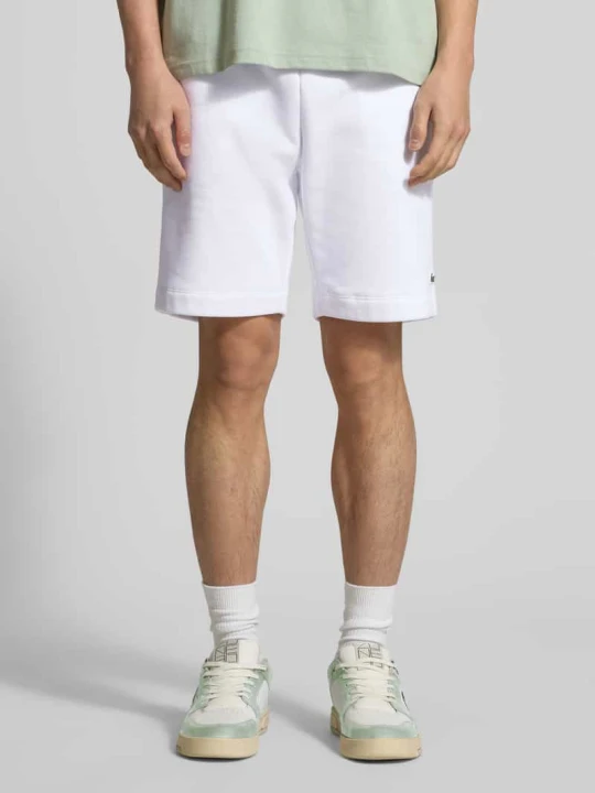 Zdjęcie produktu Szorty dresowe o kroju regular fit z mieszanki bawełny Lacoste Biały