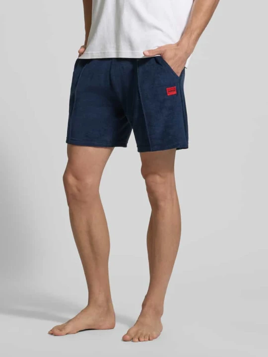 Zdjęcie produktu Szorty dresowe o kroju regular fit z mieszanki bawełny model 'TERRANCE' Hugo Granatowy